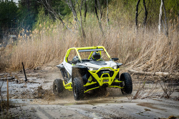 istock Cool view of active 4x4 vehicle driving in mud and water at spring 1481972698