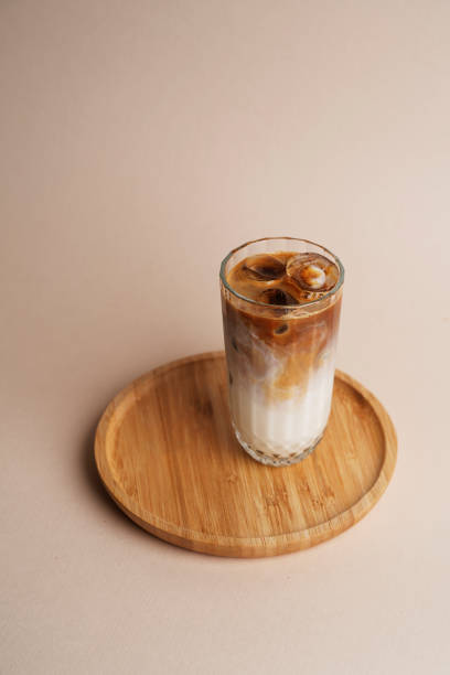 istock Iced coffee cocktail glass on pastel background 1481974677