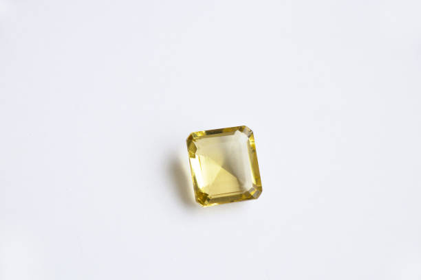 Close-up of a collection of precious multi-colored stones on a white background