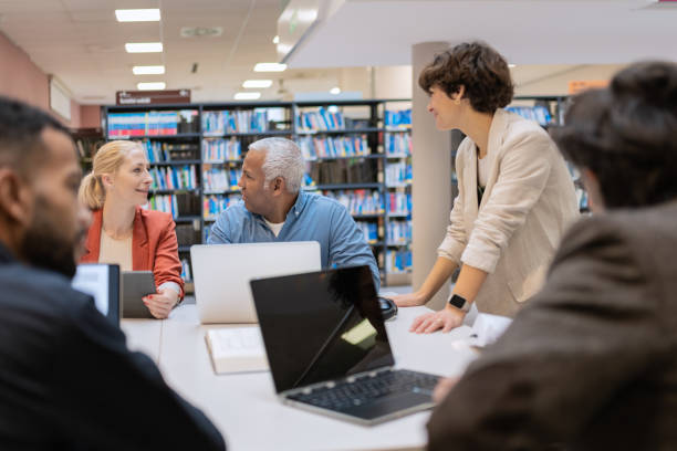 istock Readers and students in the library 1481989226