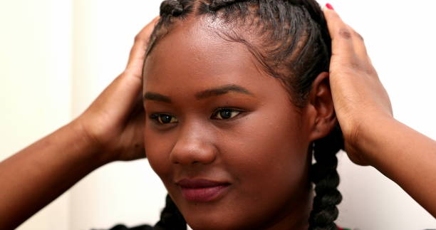 istock Casual Black African girl looking at herself in mirror reflection 1481991604