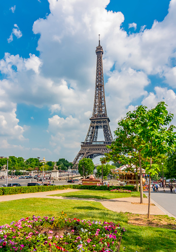 The Eiffel Tower is a wrought-iron lattice on the Cham de Mars in Paris.