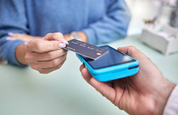 istock Shopping, hands or payment with a credit card by a customer checkout transaction at optometrist. Finance, zoom or people make a fintech electronic machine purchase or point of sale at a retail store 1481999831