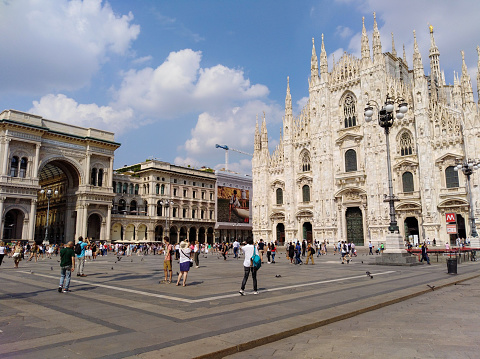 Panoramic view of Duomo Square and its famous Milan Cathedral (Duomo di Milano) the largest church in Italy. Milano
