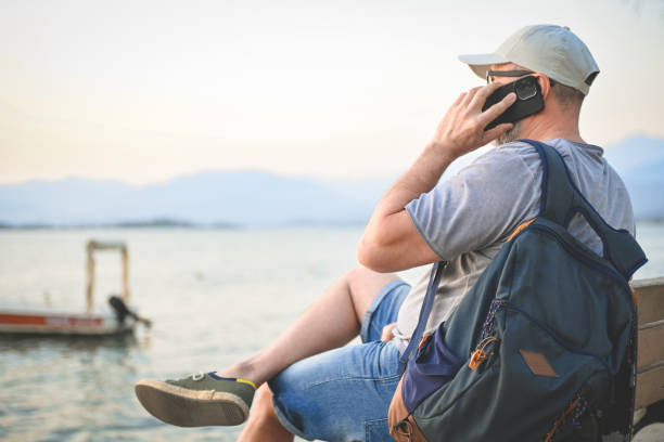 istock mature adult man resting on the beach 1482000726