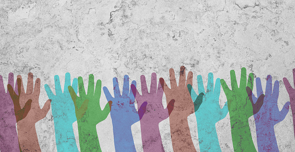Group of colorful hands on a wall, volenteer concept, charity and friendship, support teamwork