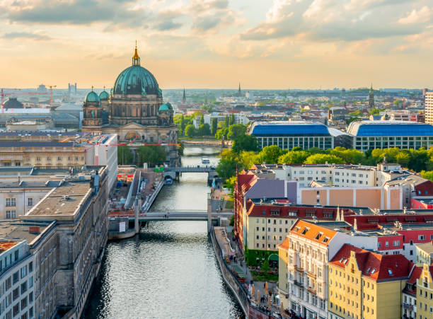 Berlin Cathedral (Berliner Dom) on Museum island and Spree river at sunset, Germany stock photo