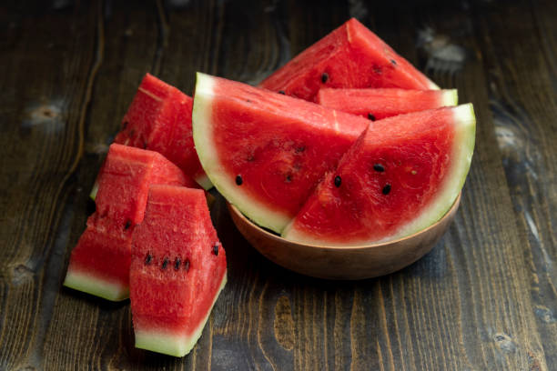 istock Sliced red and ripe watermelon on the table 1482002136