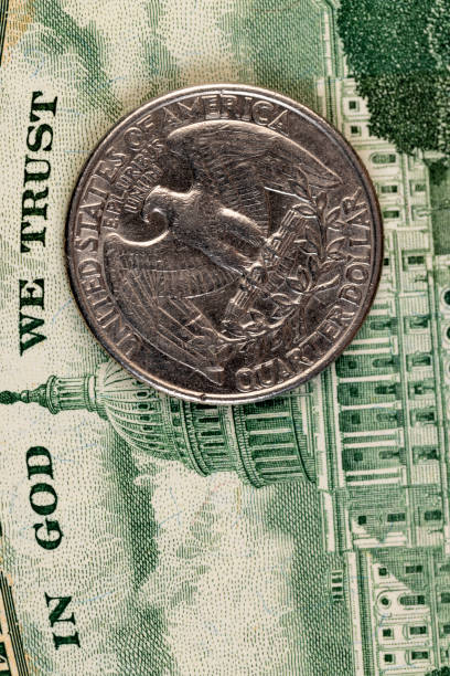 istock old American quarter dollar coins, close-up 1482002391