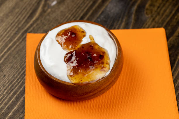 istock natural white milk yogurt with the addition of fig jam 1482002605