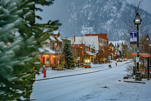 Banff, Canada - November 2019: Cozy winter scene on Banff Avenue, in the mountain town of Banff.