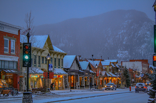 Banff, Canada - November 2019: Cozy winter scene on Banff Avenue, in the mountain town of Banff.