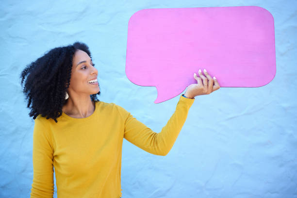 istock Communication, black woman and speech bubble for advertising, information or mockup on blue studio background. African American female, lady or poster for logo, happy or brand development on backdrop 1482007700