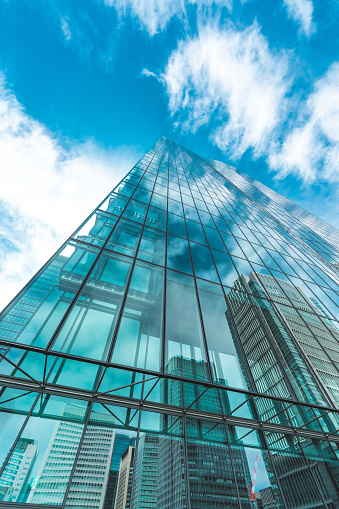 The top of a tall building with a beautiful sky. Copy space background