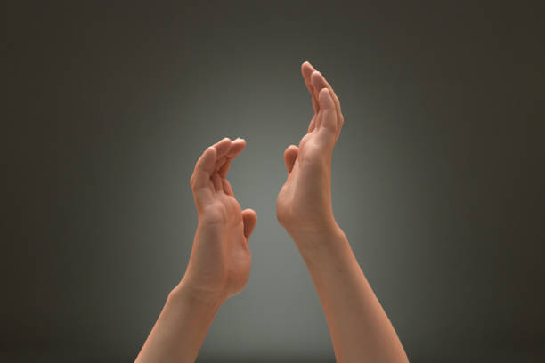 istock Women's palms up in a dance gesture 1482012891