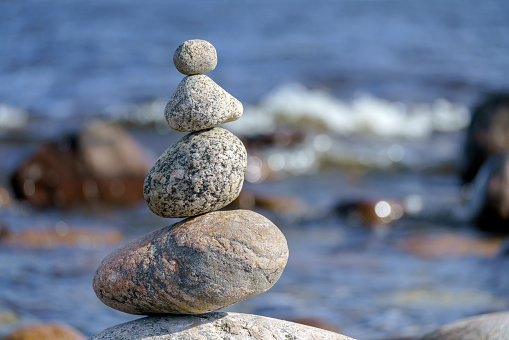 Pile of stones on the calm beach