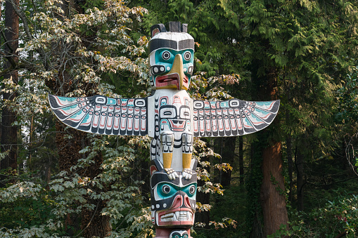 Vancouver, Canada - May 2, 2012 : Upper section of a West Coast First Nation totem pole seen from below.