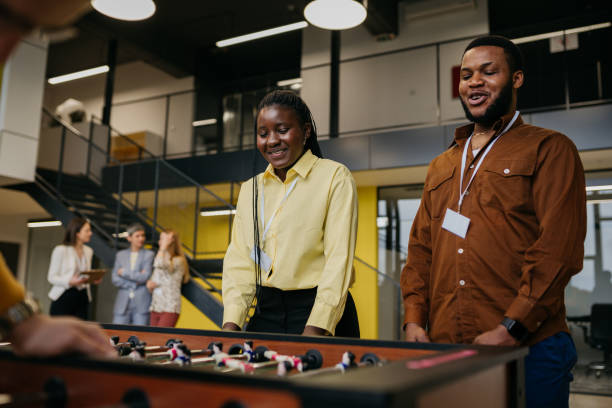 istock Business Colleagues Playing Table Football 1482050009
