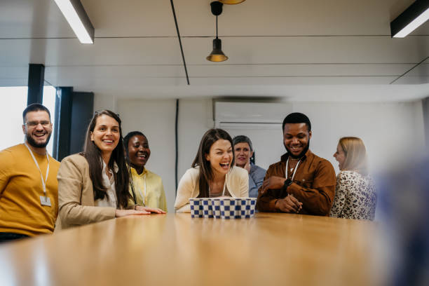 istock Business people having fun at the office 1482050014