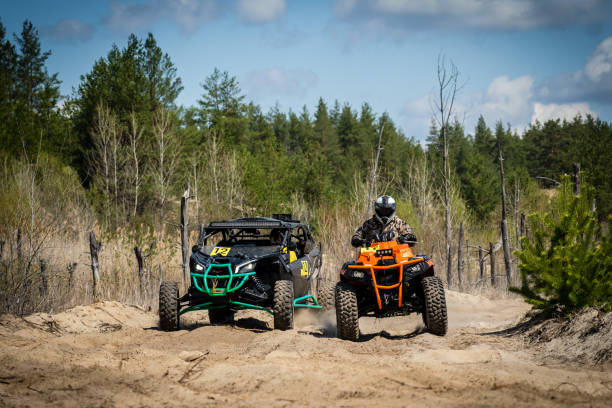 istock Two professional quad ride fast on sand. Quad racing, ATV 4x4 1482051696