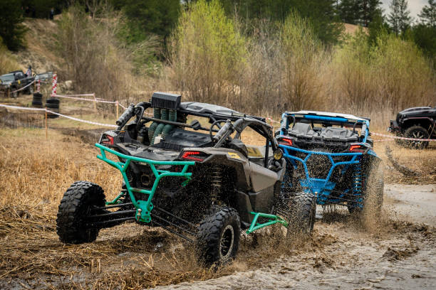 istock Atv vehicles in muddy water at the quad (buggy) competition 1482053395