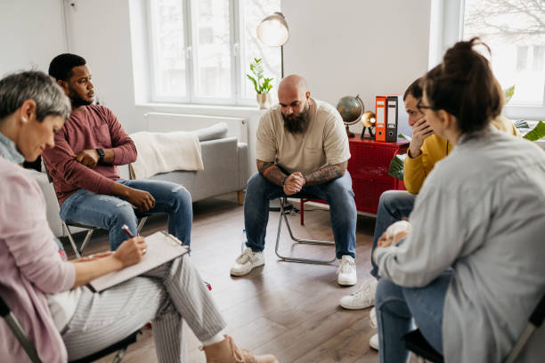 istock Multiracial group of people having a psychotherapy 1482053923