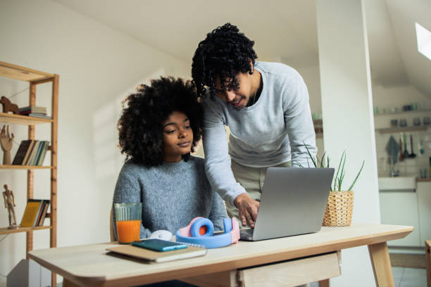 istock Young woman and man are working from home 1482059679