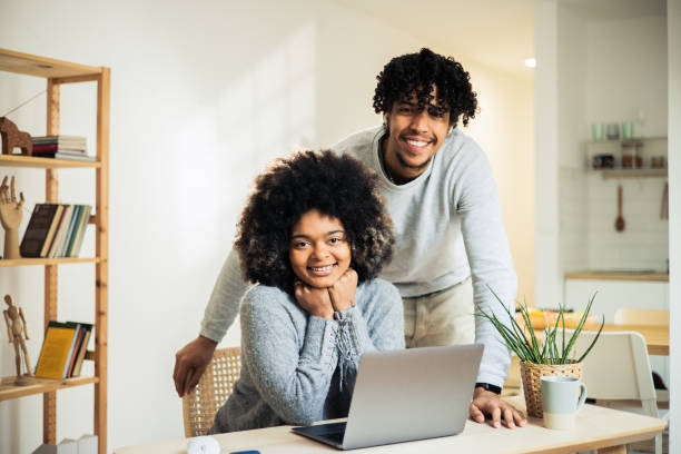 istock Young woman and man are working from home 1482059854