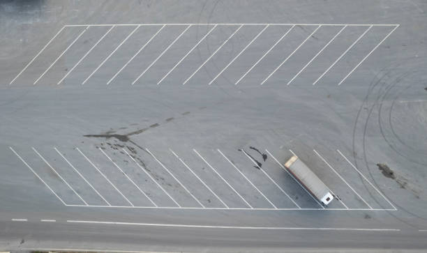 istock Trucks on a parking lot. Rest Area on a highway road 1482061031