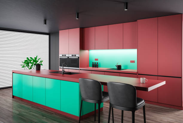 istock Dark red and green Modern minimalist kitchen with long island with stools. Dark matte materials. 1482065422