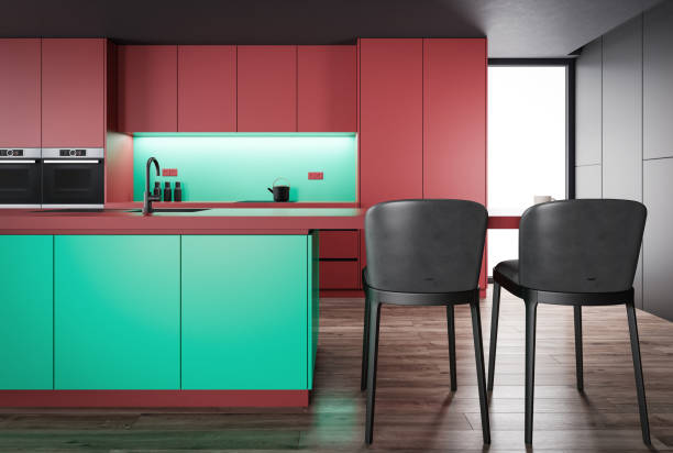 istock Dark red and green Modern minimalist kitchen with long island with stools. Dark matte materials. 1482065445