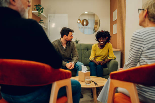 istock Multiracial people talking about their mental health on a group therapy session 1482071891