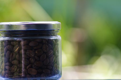 Glass jar filled with coffee beans