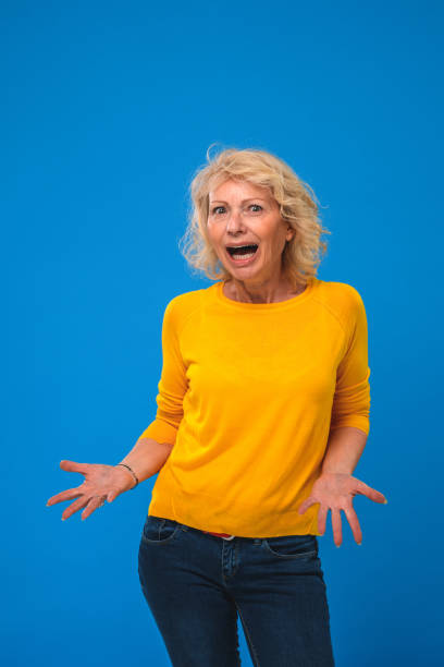 istock Surprised Mature Woman Portrait in Studio 1482080520
