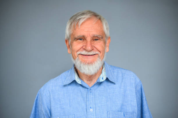 istock Caucasian Mature Male Smiling at Partner 1482080533