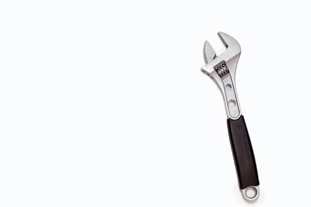 Modern adjustable wrench on a white background with free space for text. The concept of a tool for repair or construction. Special tool for repairing pipes and clamp nuts