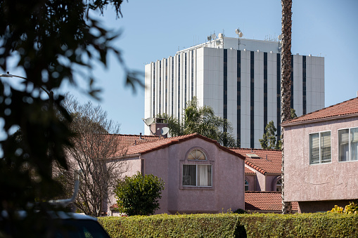 Afternoon palm framed view of downtown Compton, California, USA.