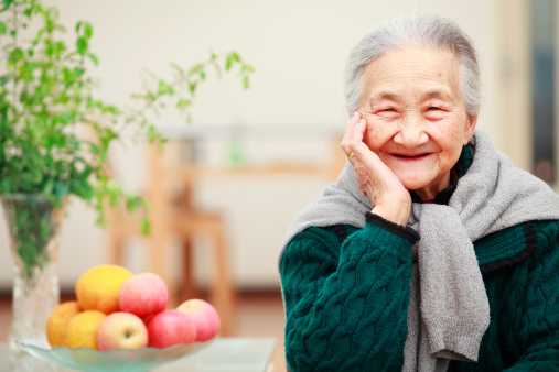 picture of happy senior asian woman in home