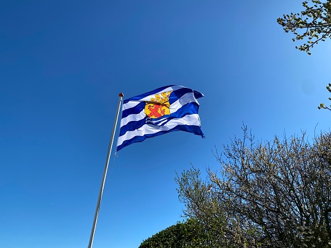 Portuguese Flag flying at Edward VII Park at the top of Avenida da Liberdade in Lisbon