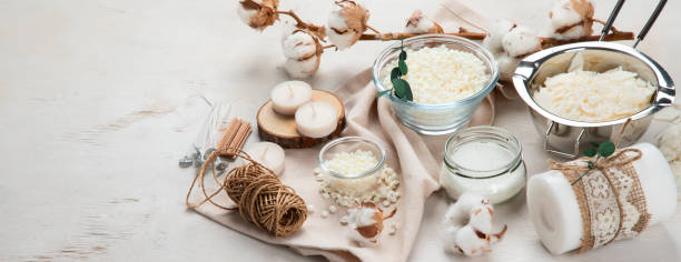 istock Basic set for home-made natural white eco soy wax candles in glass, wick, perfume. Idea for a hobby, business. Making trendy diy candles without harm to health on white background. 1482119435