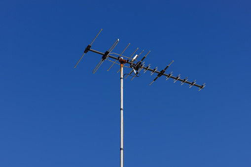 Antenna against a clear blue sky.