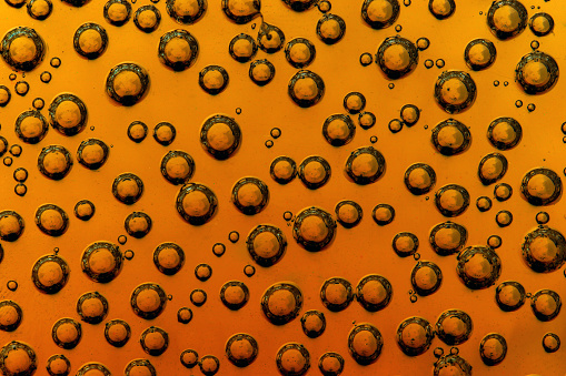 Orange background with glass droplets