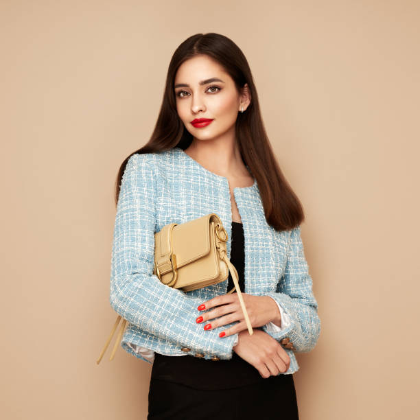istock Young brunette woman in blue jacket 1482141220
