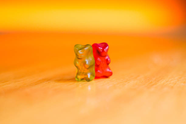 Gummy bears playing on a food table