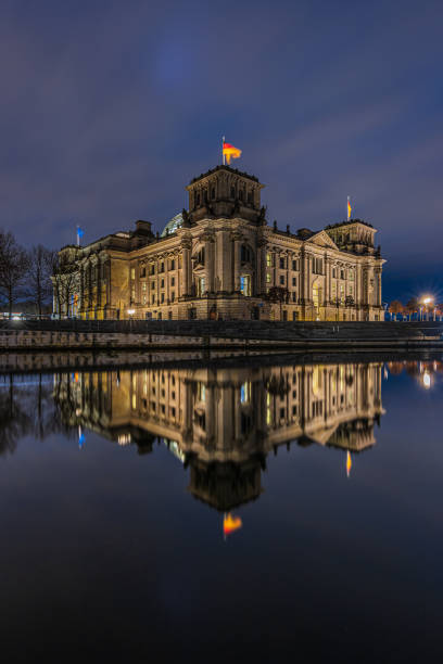 istock German parliament building with reflection on Spree water surface 1482144432