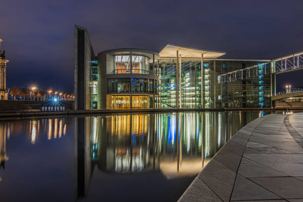 istock Government district in Berlin at night with river Spree 1482144459