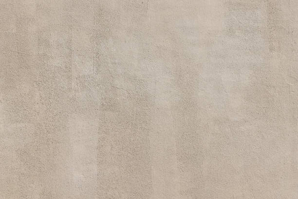 istock Section of a rough beige wall 1482147988