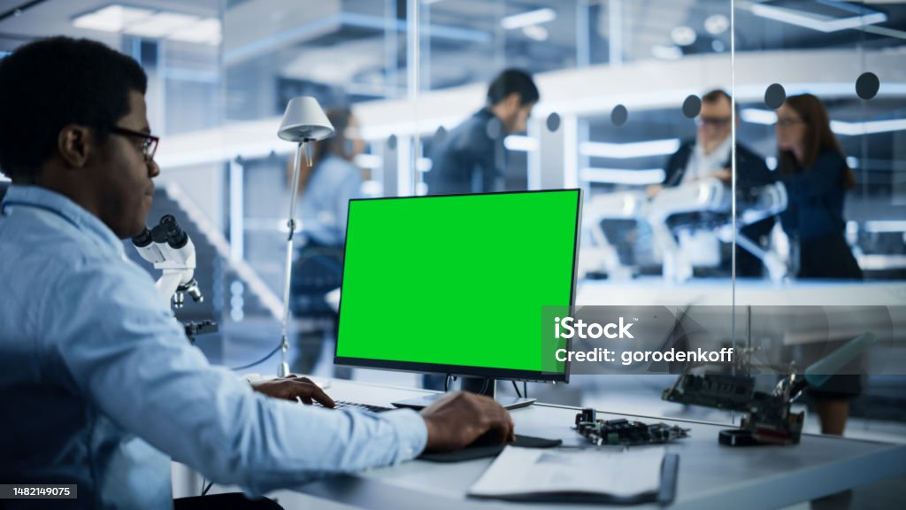 Developer Lab Clean Software Developer Working On Computer With Green Screen Mock Up ...