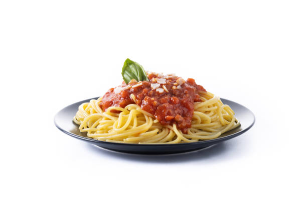 Spaghetti with bolognese sauce isolated on white background stock photo