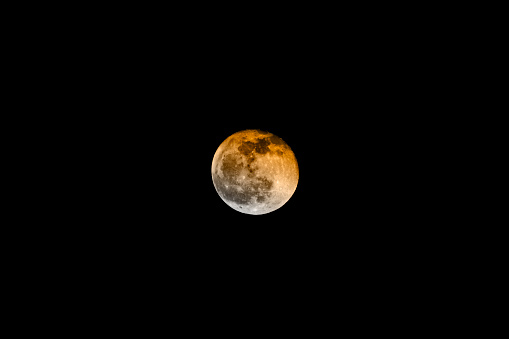 Blood supermoon close up with craters